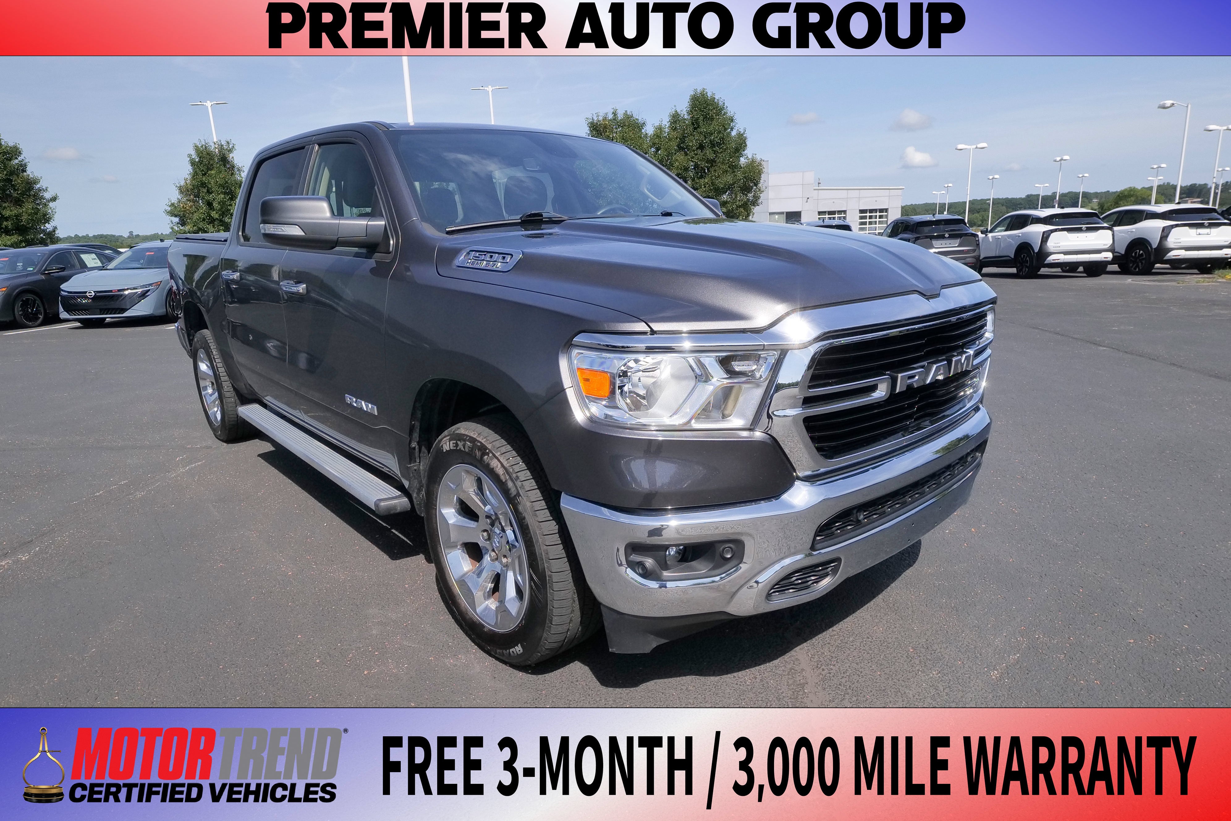 2020 RAM 1500 Big Horn in Granite Crystal Metallic Clearcoat — front three-quarter view