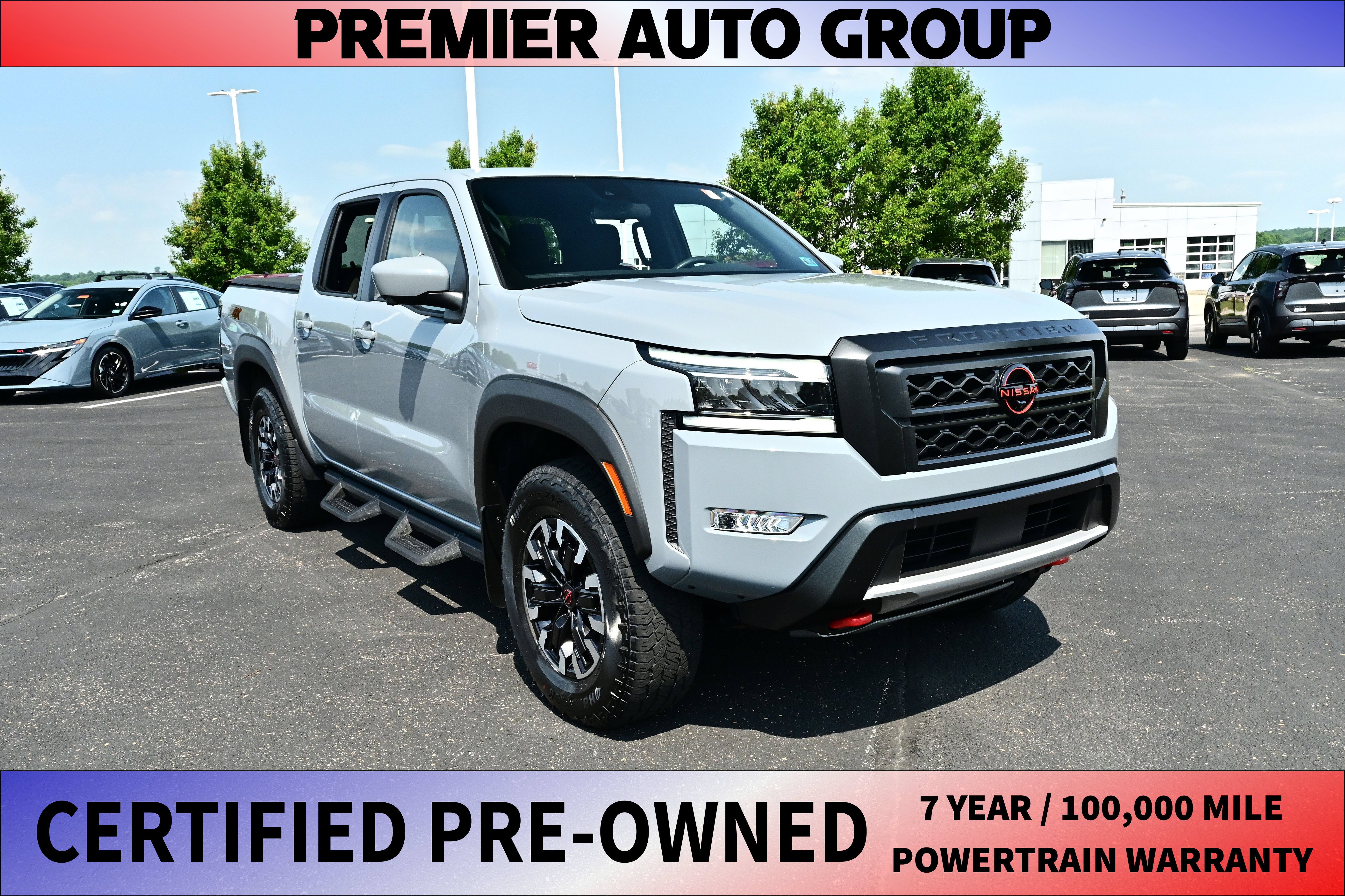 2024 Nissan Frontier Crew Cab PRO-4X in Boulder Gray Pearl — front three-quarter view