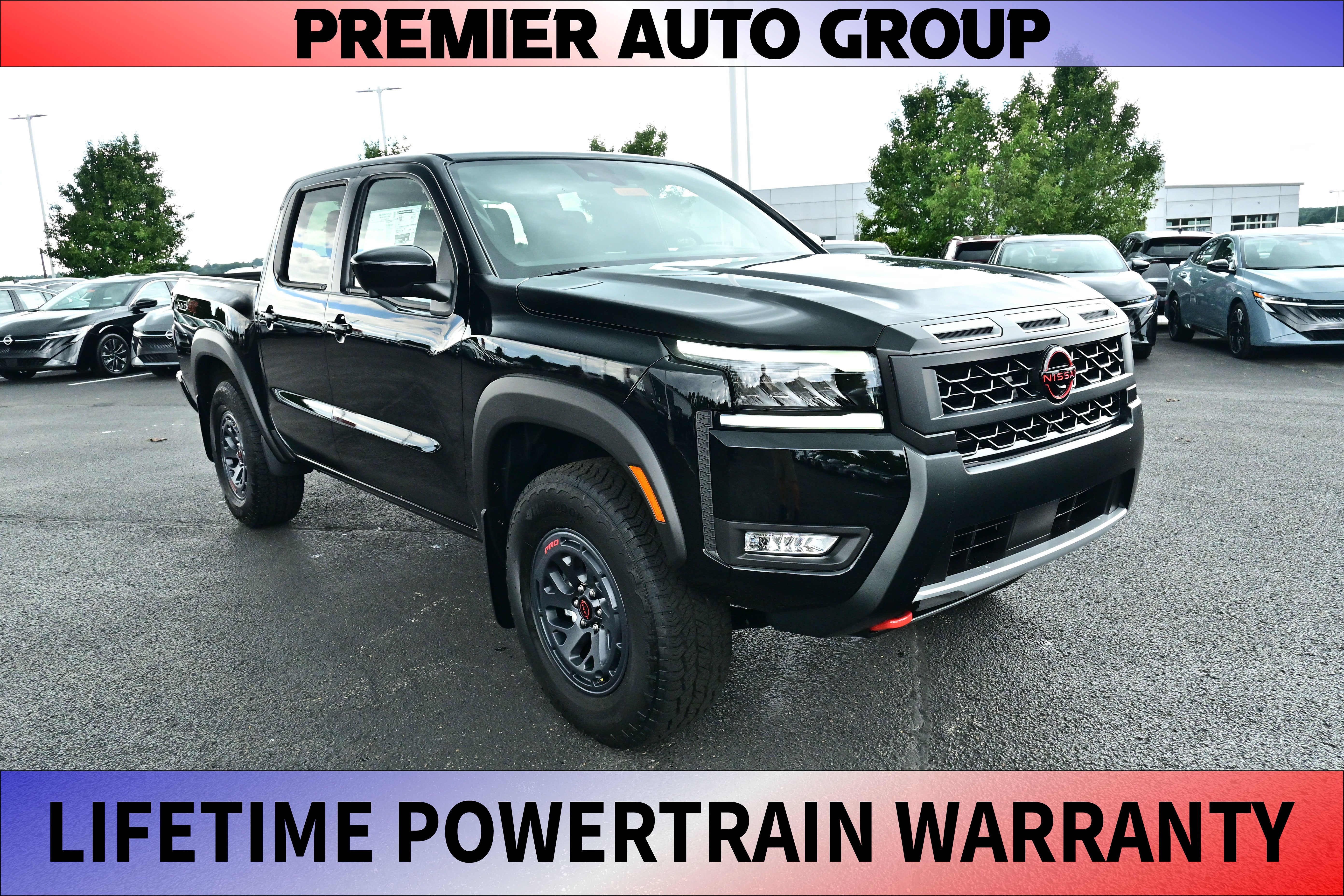 2026 Nissan Frontier Crew Cab PRO-4X in Super Black — front three-quarter view