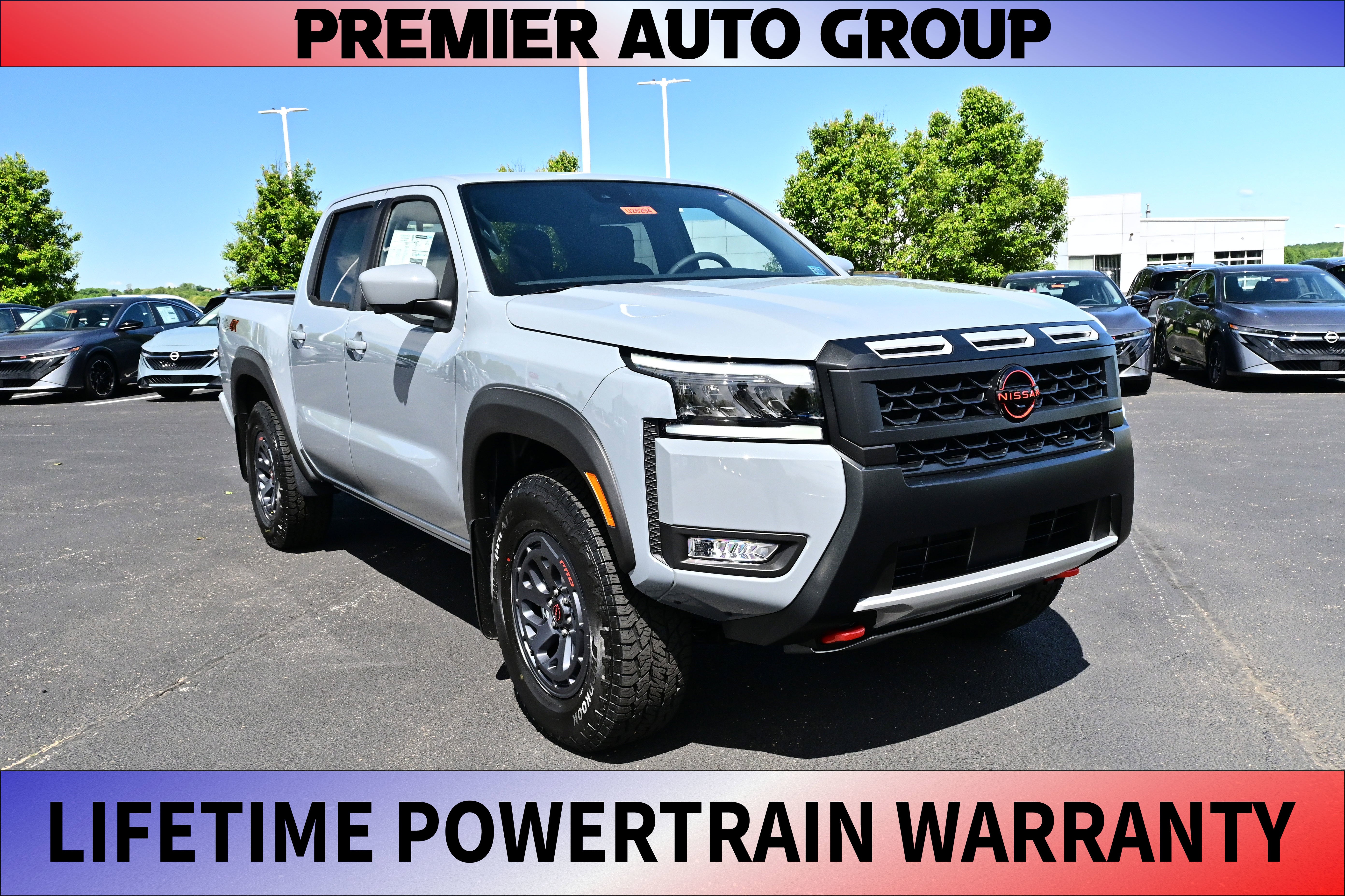 2026 Nissan Frontier Crew Cab PRO-4X in Boulder Gray Pearl — front three-quarter view
