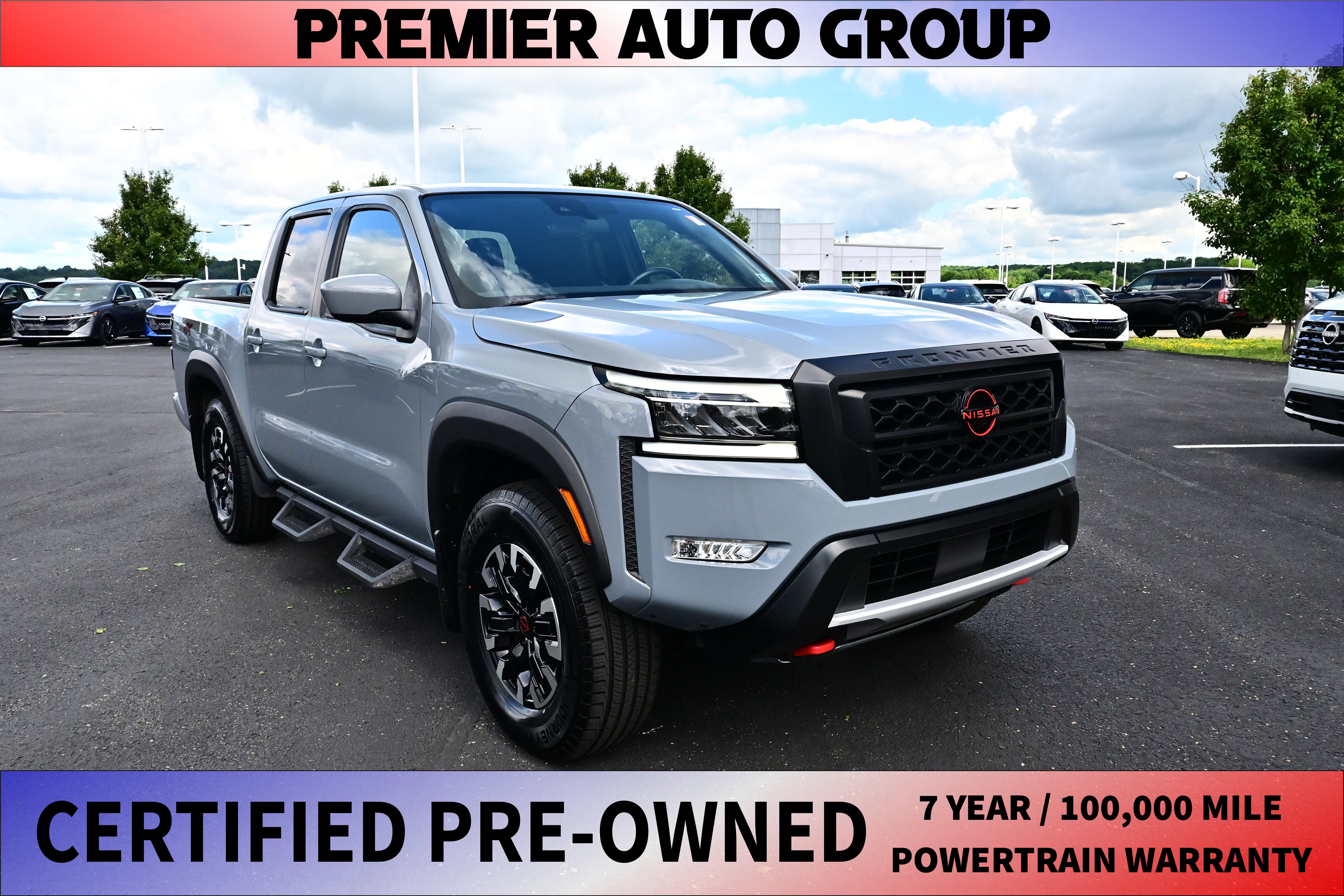 2024 Nissan Frontier Crew Cab PRO-4X in Boulder Gray Pearl — front three-quarter view