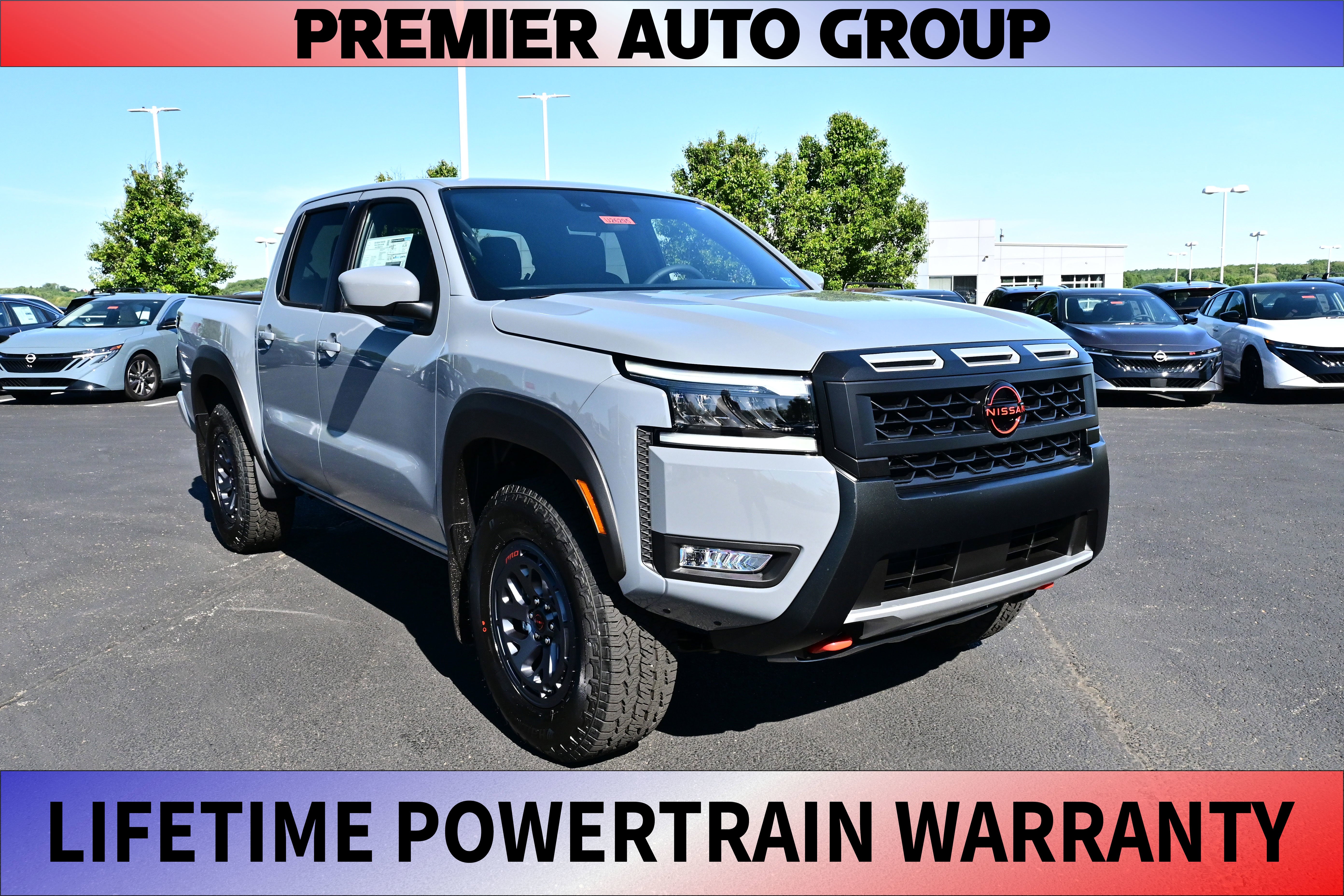 2026 Nissan Frontier Crew Cab PRO-4X in Boulder Gray Pearl — front three-quarter view