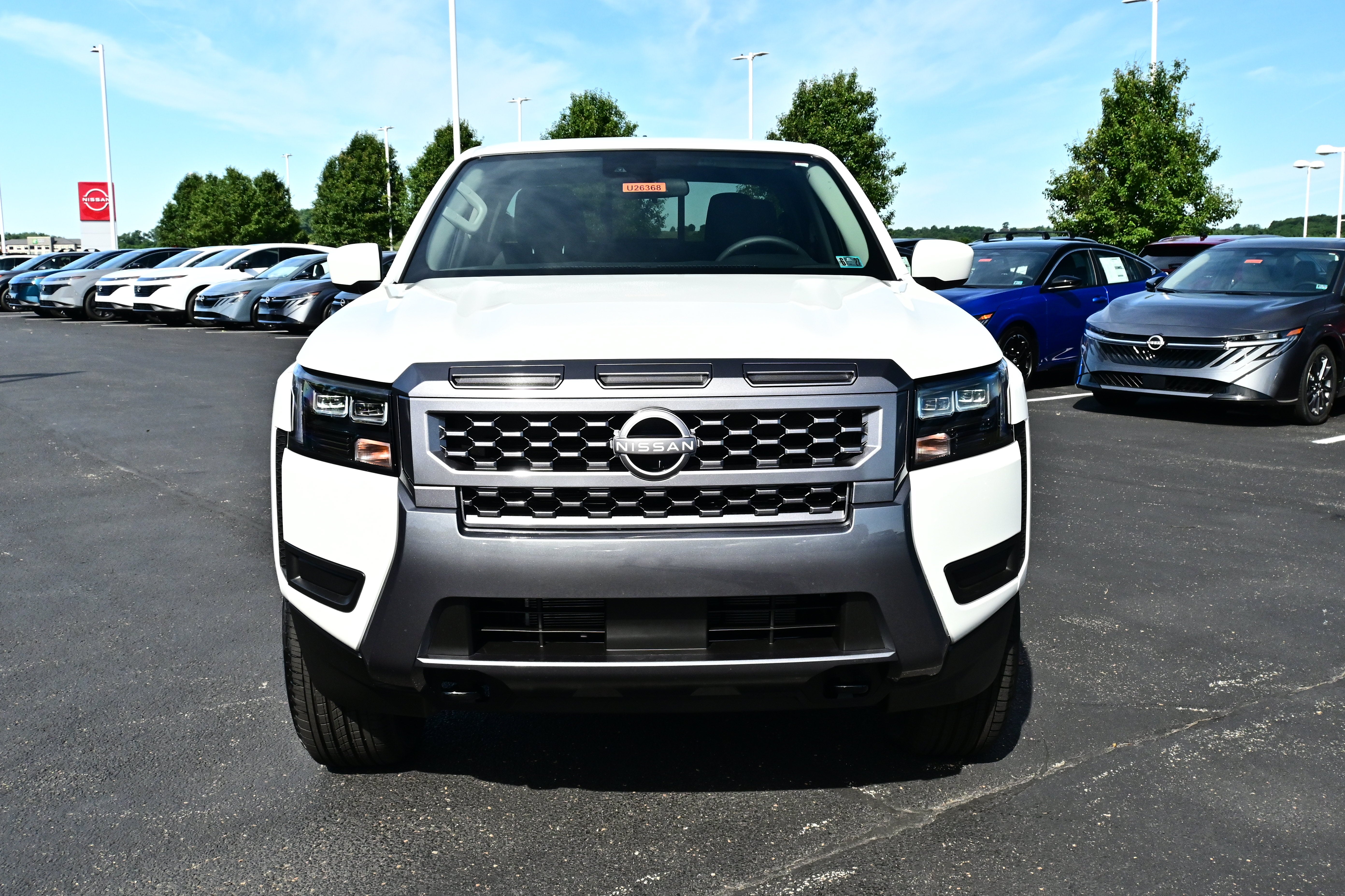 2026 Nissan Frontier — rear three-quarter view