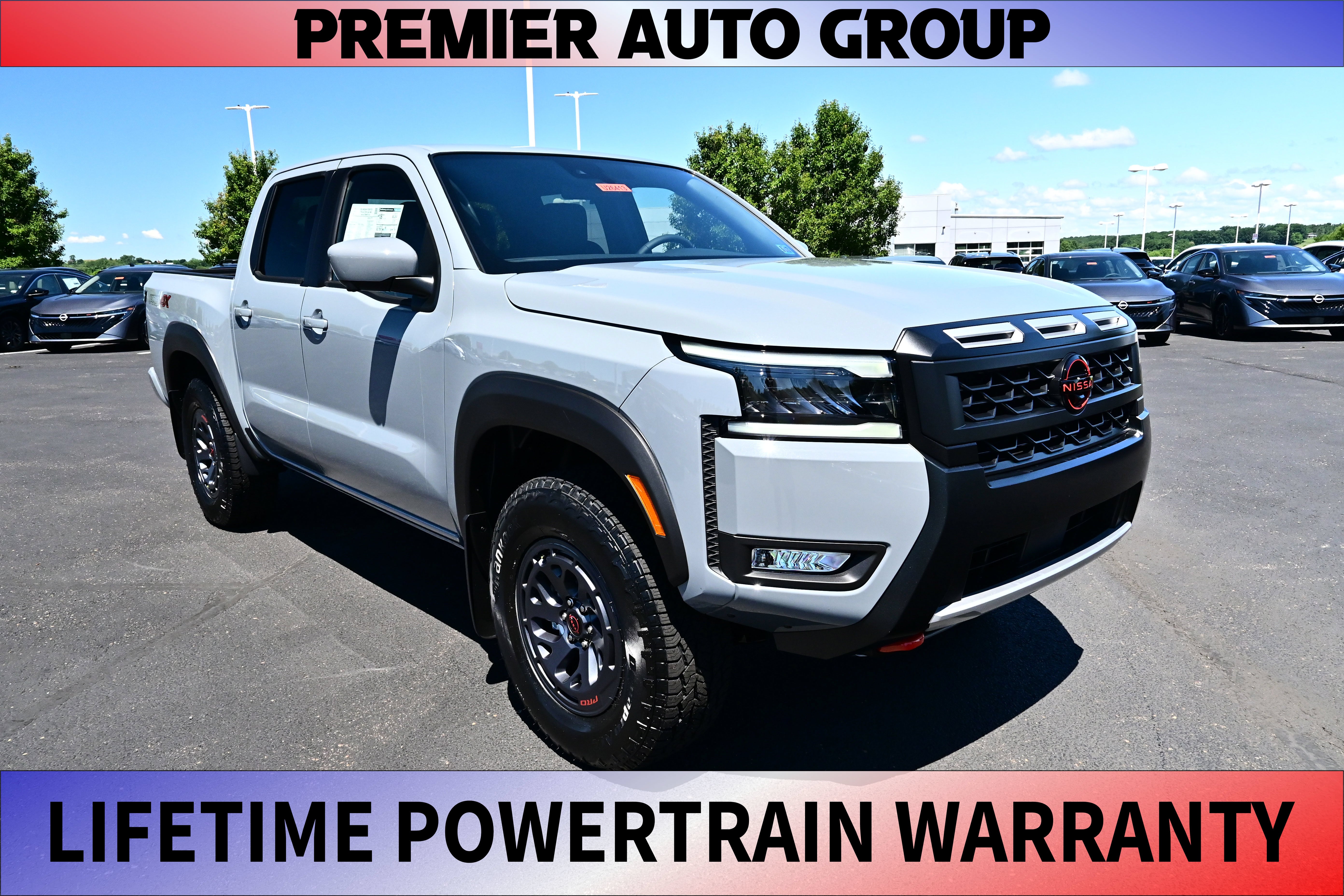 2026 Nissan Frontier Crew Cab PRO-4X in Boulder Gray Pearl — front three-quarter view