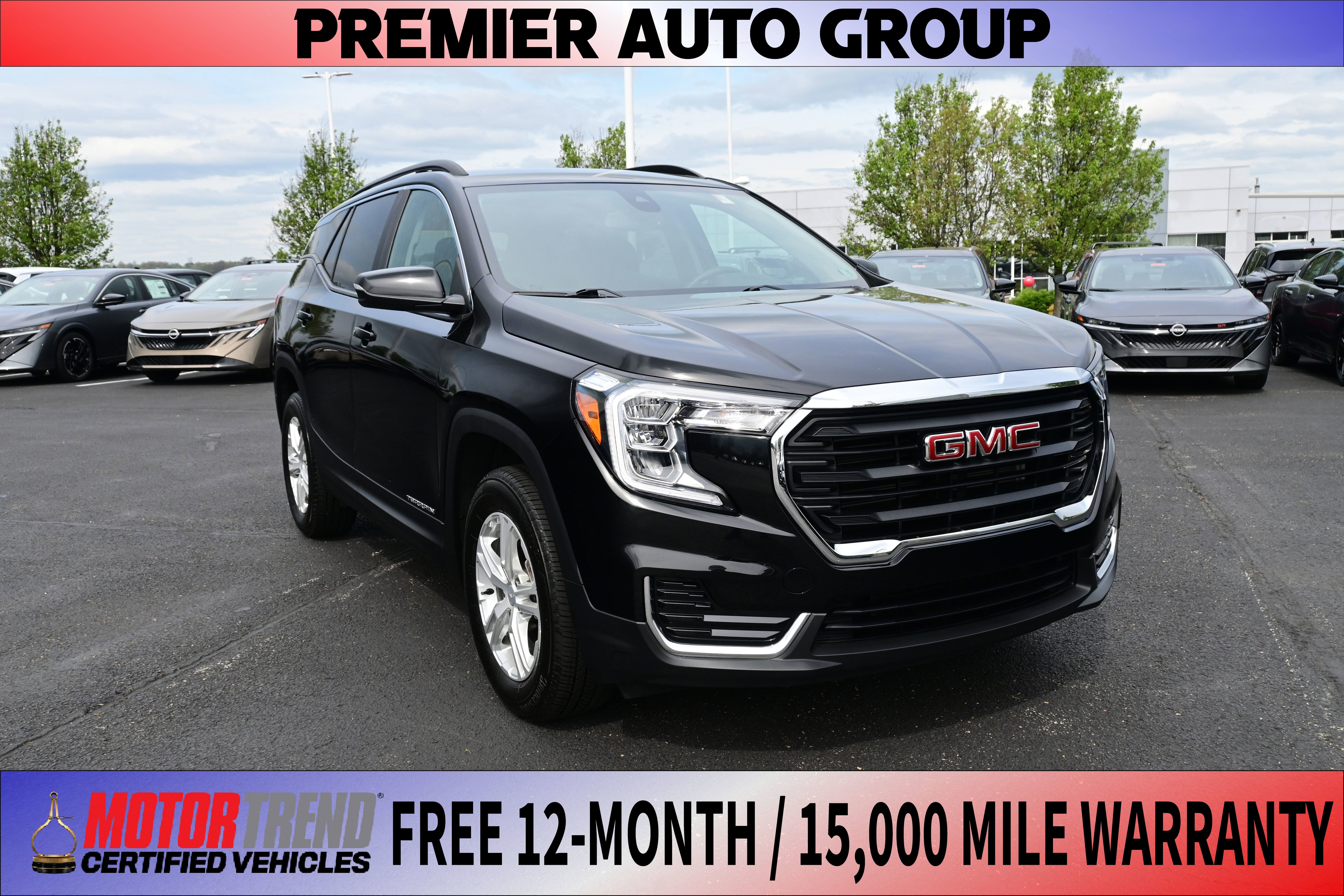 2023 GMC Terrain SLE in Ebony Twilight Metallic — front three-quarter view